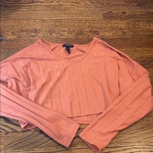 publik coral colored cropped long sleeved